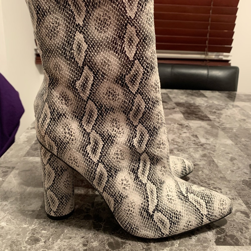 White/black snake skin booties